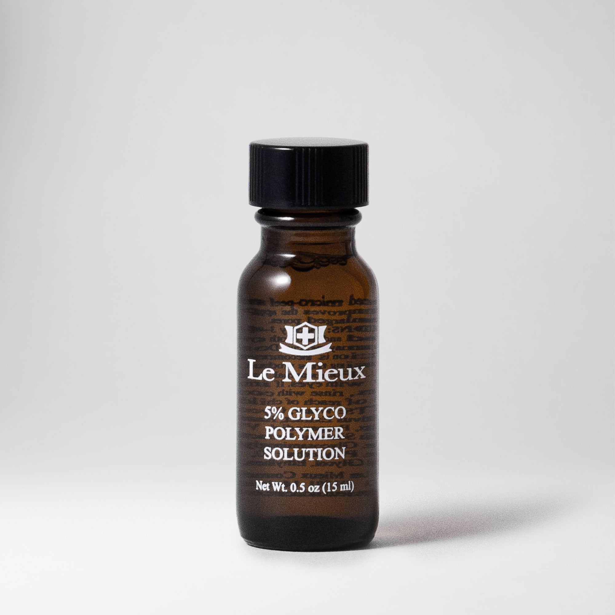 5% Glyco Polymer Solution 0.5 oz amber bottle with black lid isolated on a light grey background