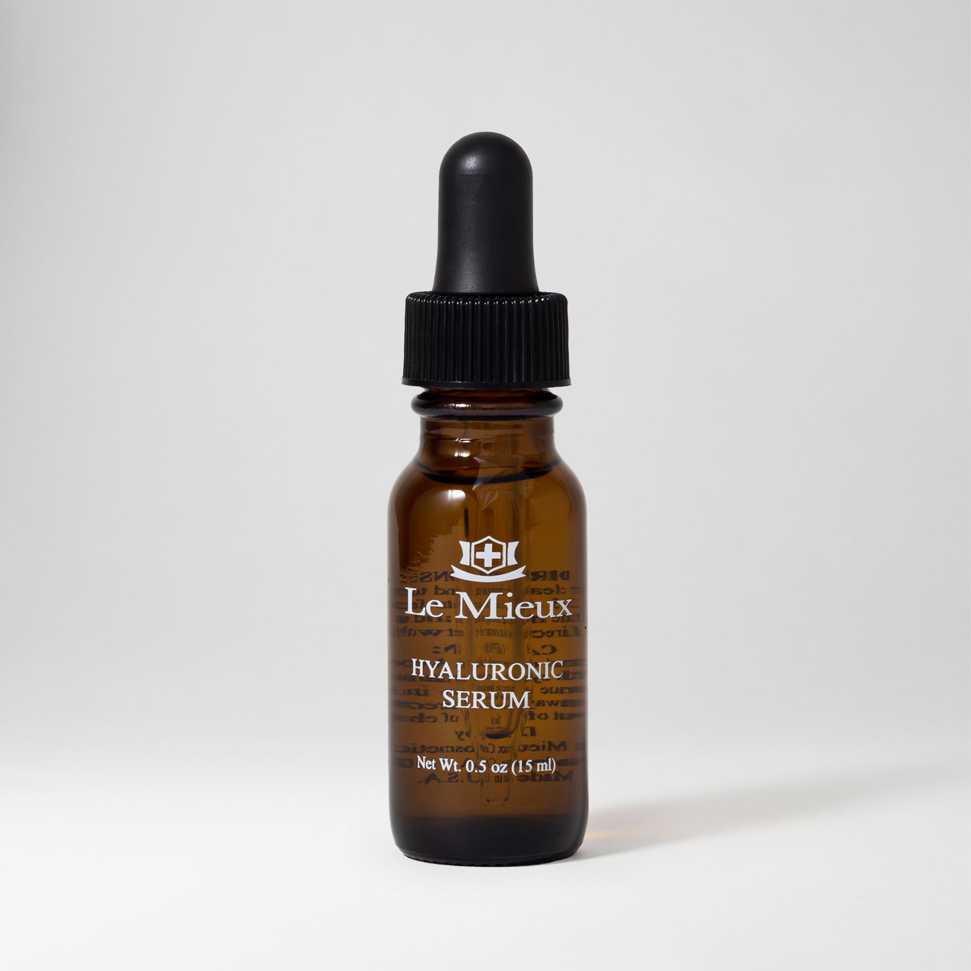 Hyaluronic Serum 0.5 oz bottle isolated on a light grey background