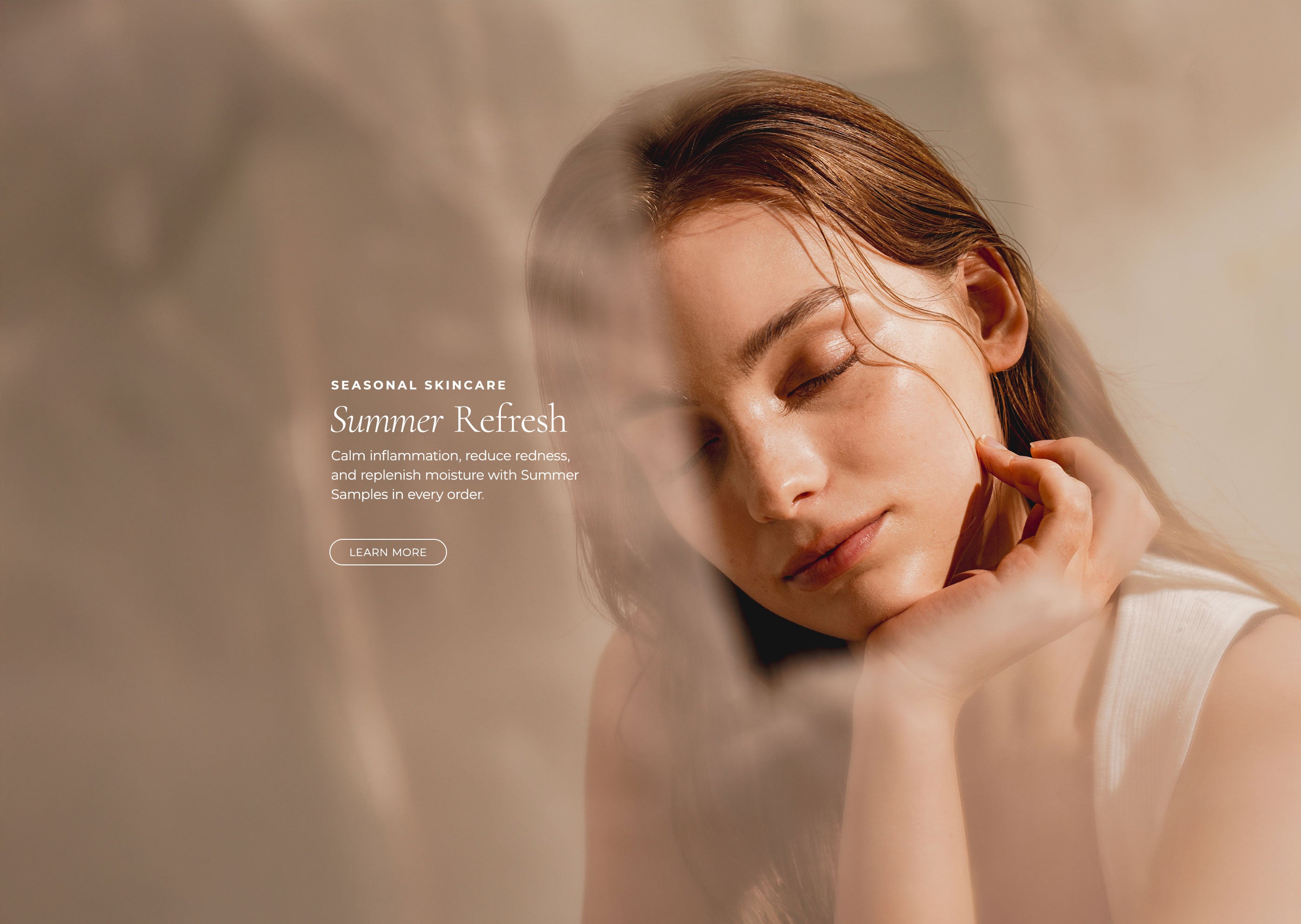 Woman resting her chin on her hand with eyes closed.