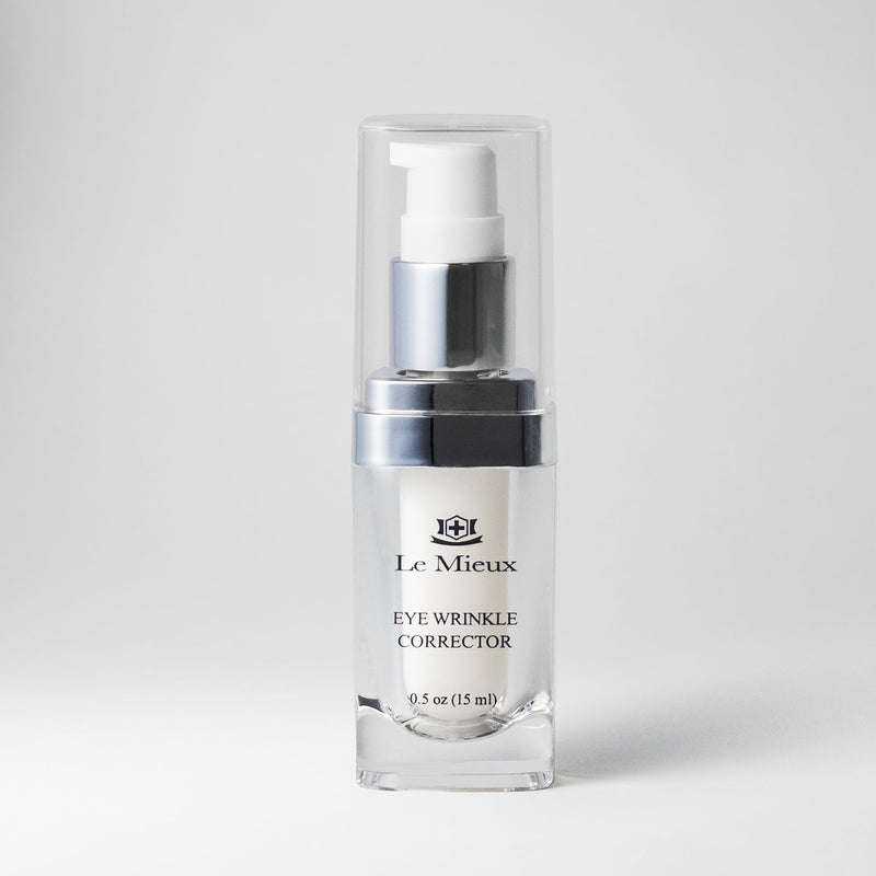 Clear bottle with white product inside. Bottle reads "Eye Wrinkle Corrector" and is isolated in front of a light grey background.